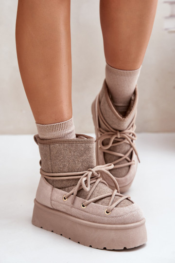 Bottes de neige avec détails élégants et plateforme en beige 2