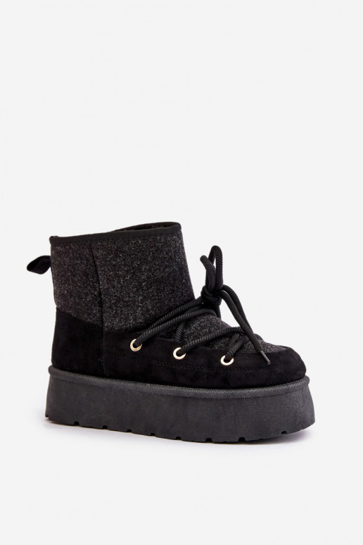 Bottes de neige avec des détails élégants avec une plateforme couleur noire Il fautvora Bottes de neige avec des détails élégants avec une plateforme couleur noire Il fautvora
