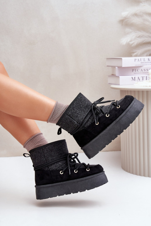 Bottes de neige avec des détails élégants avec une plateforme couleur noire Il fautvora Bottes de neige avec des détails élégants avec une plateforme couleur noire Il fautvora