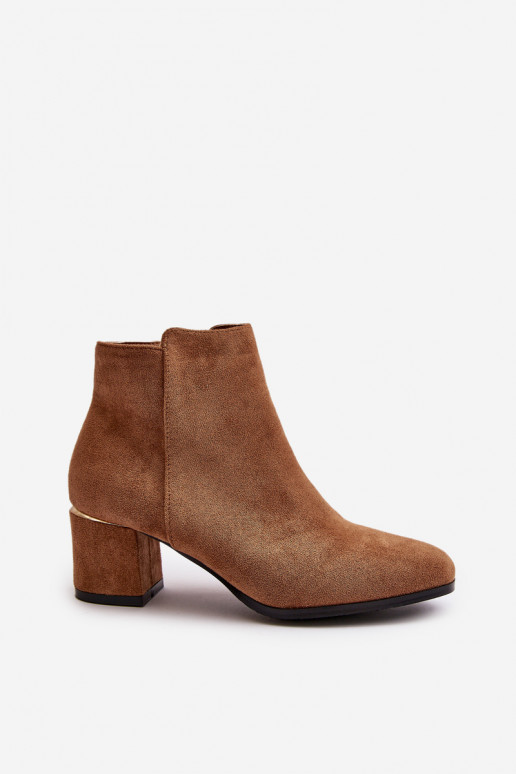 Bottines à talon en daim synthétique... Bottines à talon en daim synthétique...