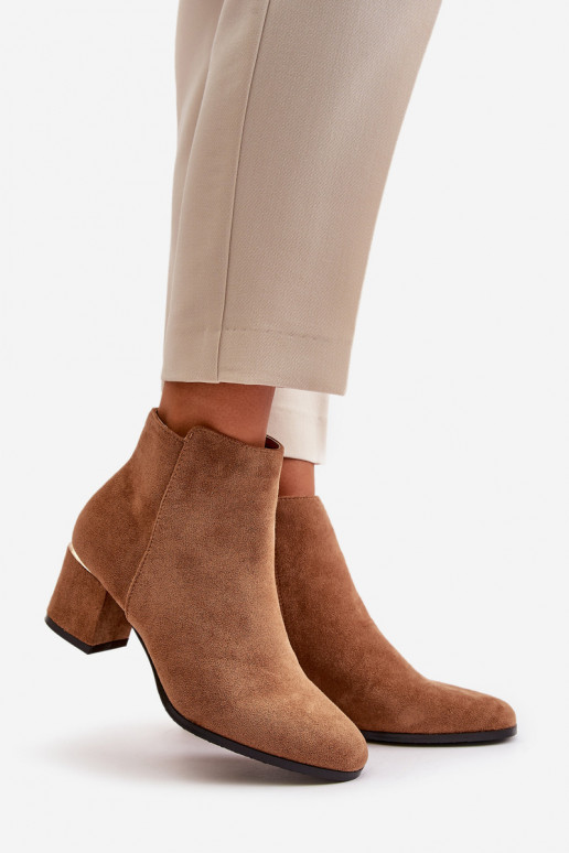 Bottines à talon en daim synthétique... Bottines à talon en daim synthétique...