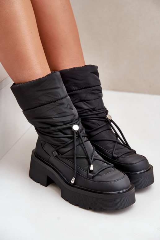 Bottes de neige Féminin avec une plateforme Et des talons plats couleur noire Seandriel Bottes de neige Féminin avec une plateforme Et des talons plats couleur noire Seandriel