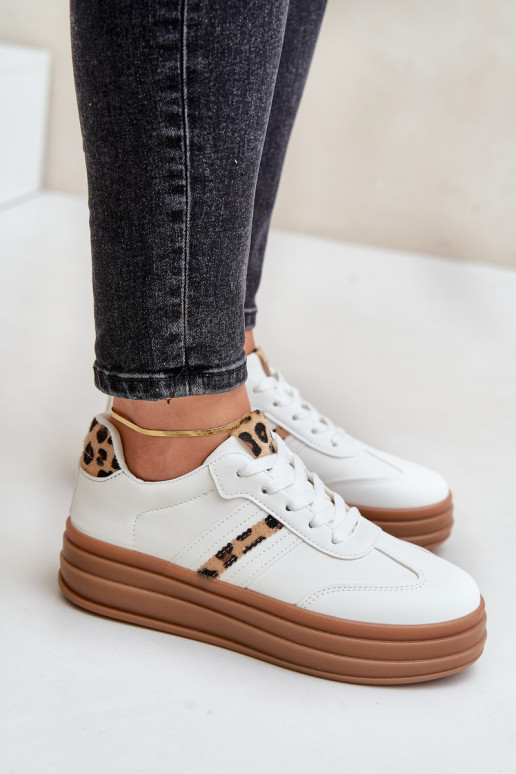 Chaussures modèle baskets Féminin avec une plateforme avec des motifs en fourrure de léopard couleur blanche Dravinnia Chaussures modèle baskets Féminin avec une plateforme avec des motifs en fourrure de léopard couleur blanche Dravinnia