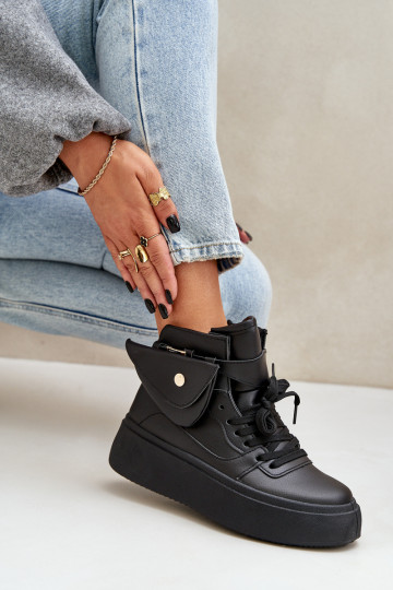 Grand Chaussures modèle baskets avec supplément avec une plateforme couleur noire Saramis