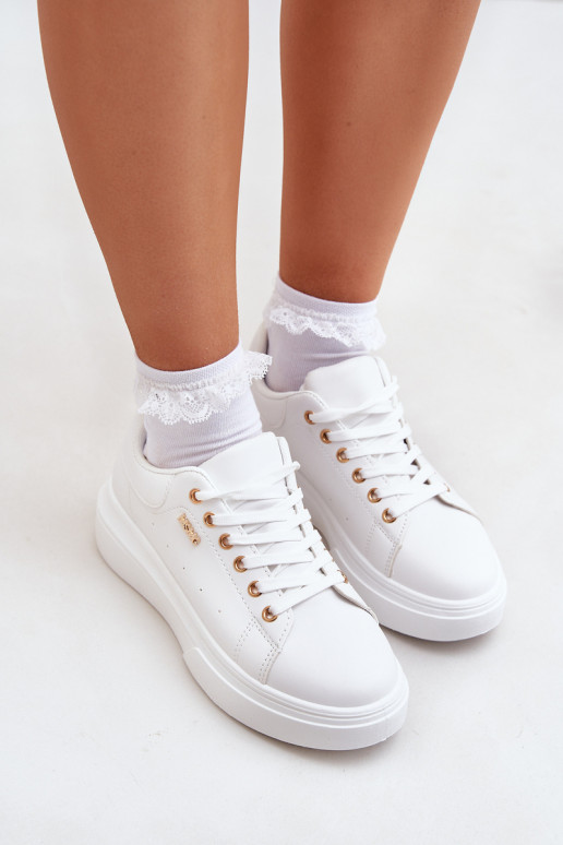 Chaussures modèle baskets Féminin avec une plateforme en cuir écologique couleur blanche Lelandine Chaussures modèle baskets Féminin avec une plateforme en cuir écologique couleur blanche Lelandine