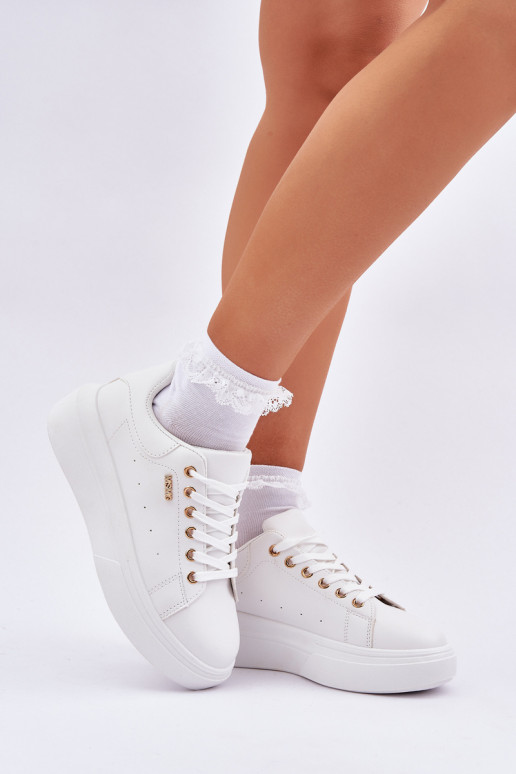 Chaussures modèle baskets Féminin avec une plateforme en cuir écologique couleur blanche Lelandine Chaussures modèle baskets Féminin avec une plateforme en cuir écologique couleur blanche Lelandine