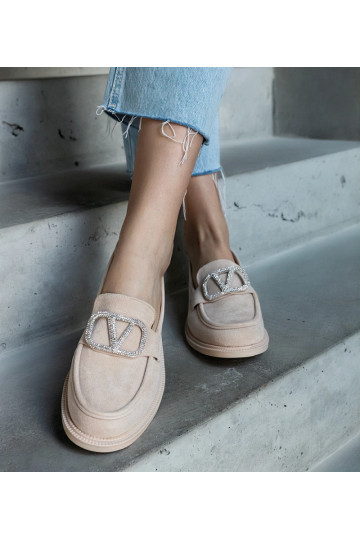 Mocassins beiges ornés de...