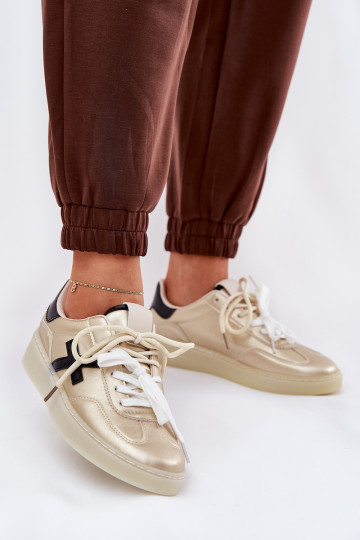 Faible baskets Féminin couleur dorée Zelevelis