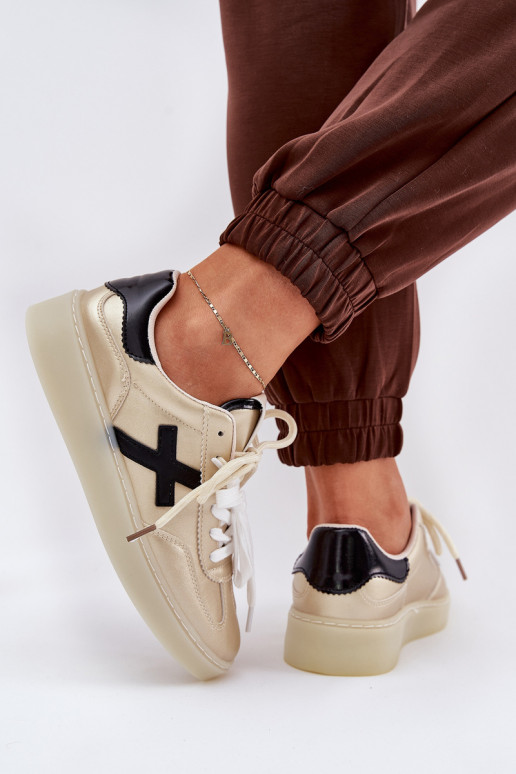 Faible baskets Féminin couleur dorée Zelevelis Faible baskets Féminin couleur dorée Zelevelis