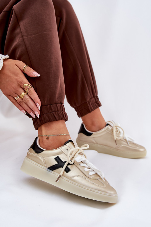 Faible baskets Féminin couleur dorée Zelevelis Faible baskets Féminin couleur dorée Zelevelis