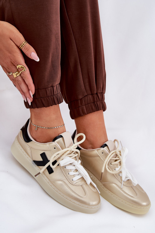 Faible baskets Féminin couleur dorée Zelevelis Faible baskets Féminin couleur dorée Zelevelis