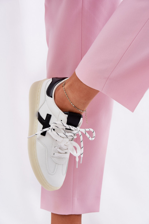 Faible baskets Féminin couleur blanche Zelevelis