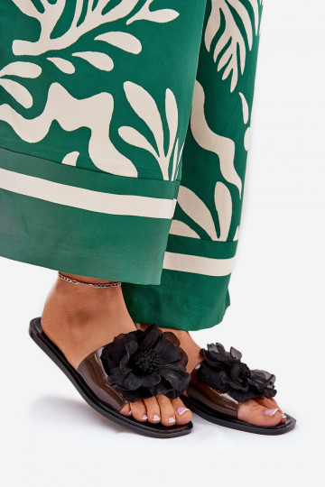 Mules à semelle plate transparentes avec fleur artificielle noires Vobetta