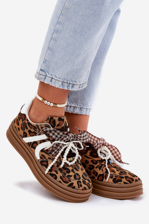 Chaussures modèle baskets Féminin avec des motifs en fourrure de léopard avec une plateforme avec de beaux détails marron Vinnes Chaussures modèle baskets Féminin avec des motifs en fourrure de léopard avec une plateforme avec de beaux détails marron Vinnes
