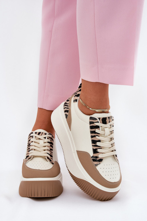 Chaussures modèle baskets Féminin avec une plateforme Zebra beige Tamorniel Chaussures modèle baskets Féminin avec une plateforme Zebra beige Tamorniel