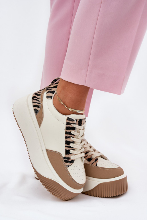 Chaussures modèle baskets Féminin avec une plateforme Zebra beige Tamorniel Chaussures modèle baskets Féminin avec une plateforme Zebra beige Tamorniel