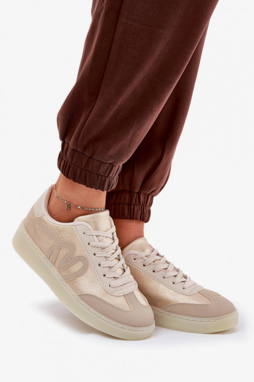 Baskets basses modèle femme en simili cuir couleur or-sable Iladira Baskets basses modèle femme en simili cuir couleur or-sable Iladira