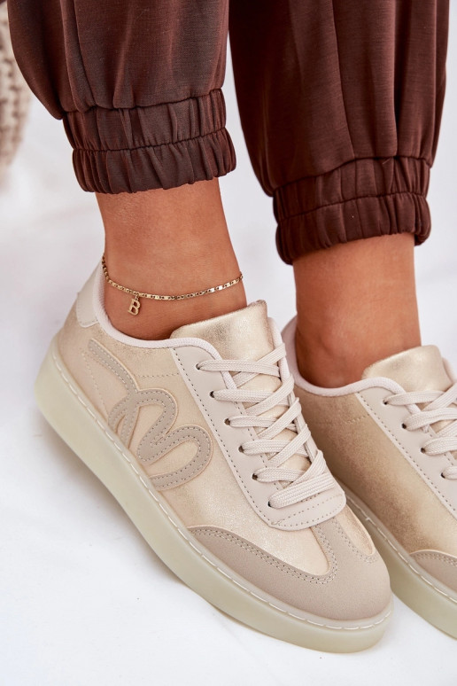 Baskets basses modèle femme en simili cuir couleur or-sable Iladira Baskets basses modèle femme en simili cuir couleur or-sable Iladira